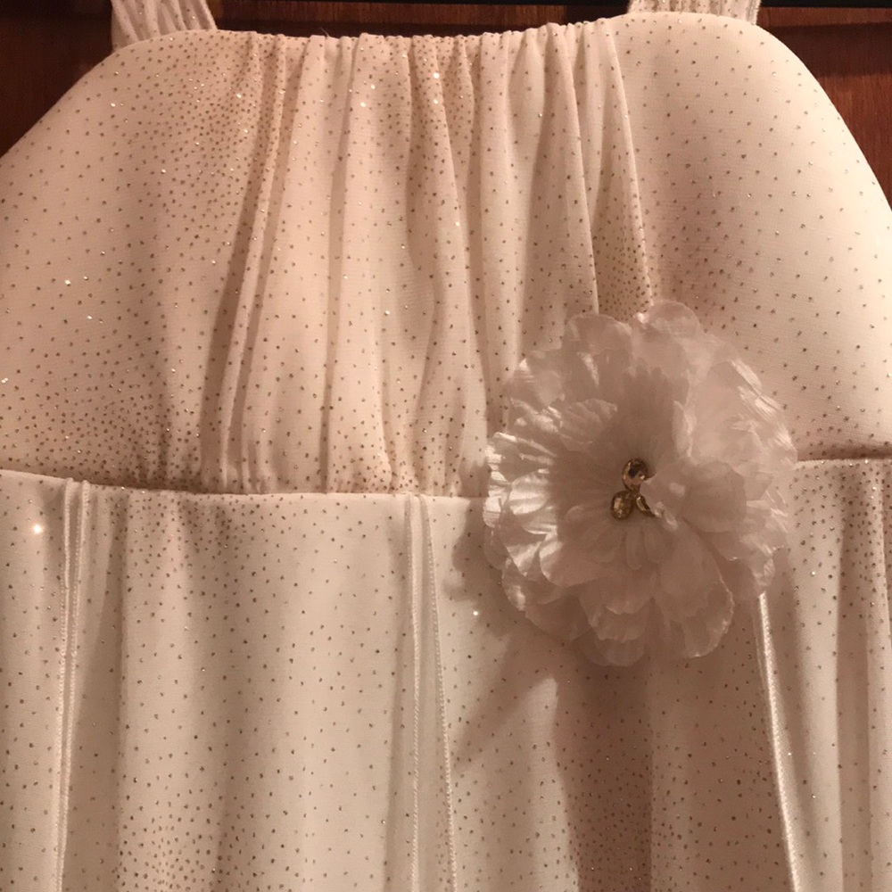 Girls dress size 14. Padded front for modesty.